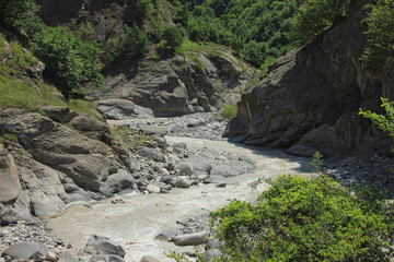 Fototapeta na wymiar Beautiful, fast river in the mountains.