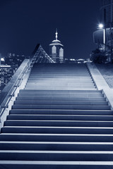 Modern stairway in downtown of Hong Kong city at night