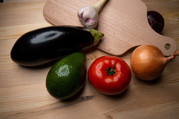 Vegetables composition on wood background