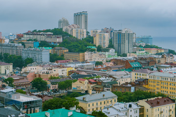 Fototapeta premium Summer, 2015 - Vladivostok, Russia - Aerial. The central historical part of the city of Vladivostok from a height. Historic buildings in the center of Vladivostok