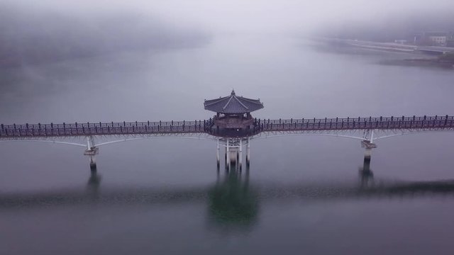 Aerial video of Wolyeonggyo bridge is located in the midst of Nakdong river, Andong, South Korea.