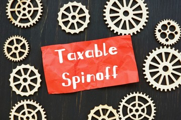 Business concept about Taxable Spinoff with sign on the page.