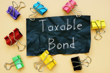 Financial concept meaning Taxable Bond with phrase on the piece of paper.
