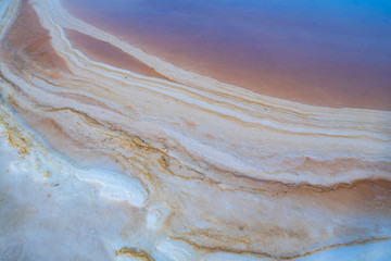 Salt is crystallizing in the salt fields at Bang Tabun city of Petchaburi province, Thailand