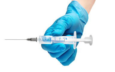 Hand in blue medical gloves holding syringe. Isolated on white.