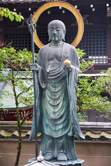 Bronze Buddha Statue in front of Daiun-in Temple. Kyoto. Japan