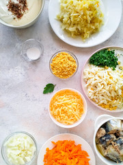 Ingredients for salad with Mimosa fish on a light background top view. Cooking food step by step.