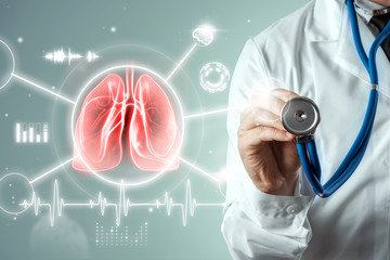 Doctor and Hologram of inflamed lungs. The concept of lung disease, pneumonia, covid-19 pandemic,...