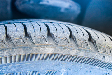 Car tire with little wear. Close-up. 