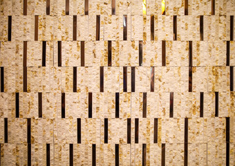Wall decoration in the house with gold plastic.