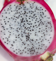 Dragon fruit on the counter in the market.