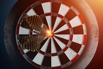 Darts, a golden dart stuck in a target. Dartboard is the target and goal. Business getting into the target audience. 3D illustration, 3D rendering, copy space.