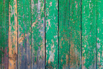 Old painted colorful wooden fence