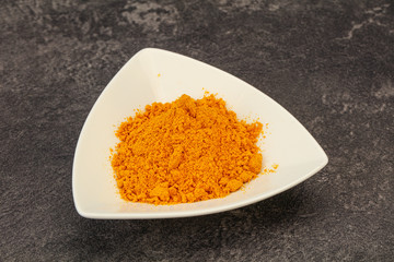 Tumeric powder in the bowl