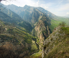 Fototapeta premium Chegem, Paragram, Kabardino-Balkar Republic. Chegem gorge. Panorama of mountains and gorges on a clear Sunny day.