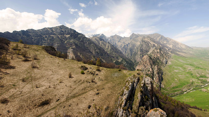 Obraz premium Chegem, Paragram, Kabardino-Balkar Republic. Chegem gorge. Panorama of mountains and gorges on a clear Sunny day.