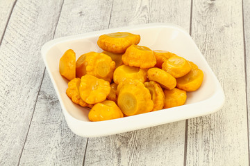 Marinated yellow patisson in the bowl