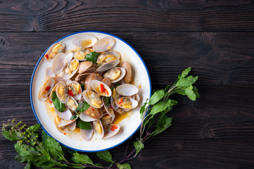Stir fried Spicy Clam (Surf clam, Short necked clam, Carpet clam, Venus shell, Baby clam) with Thai Holy Basil
