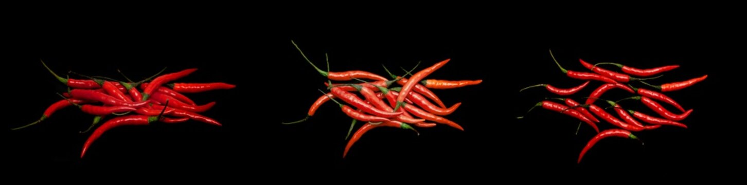 Red Chili Pepper Isolated On A Black Background.