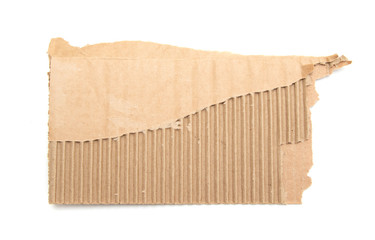 Pieces of corrugated grey cardboard are isolated on a white background.