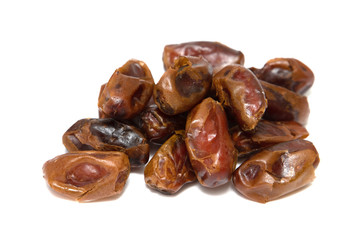 Dried dates isolated on a white background.
