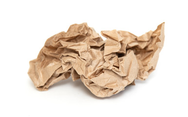 A crumpled paper bag with greasy spots highlighted on a white background.
