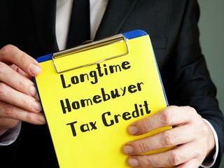 Business concept meaning Longtime Homebuyer Tax Credit with inscription on the page.