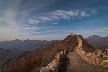 The Great Wall of China brick stairways following the steep mountain peaks at Jiankou in China