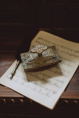 old print located on sheet music brown background