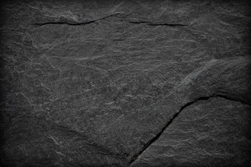 Dark grey black slate background or texture.