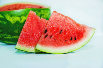 slices of watermelon on a light background, watermelon