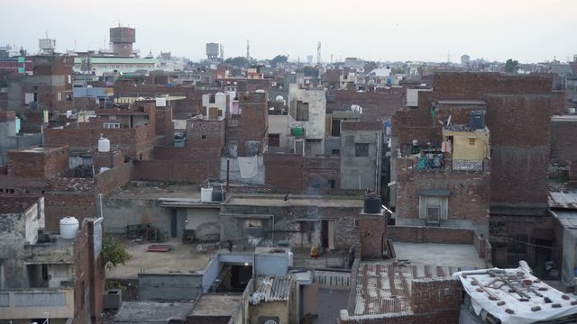 India Bare Bones Brick Buildings Cityscape View of Slum in Amritsar