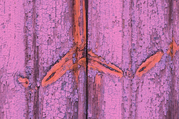Old wood background with a beautiful natural pattern, painted pink, tinted pink.