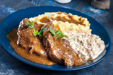 Stewed pork neck with potatoes and sauce