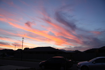 Fototapeta na wymiar sunset over houses