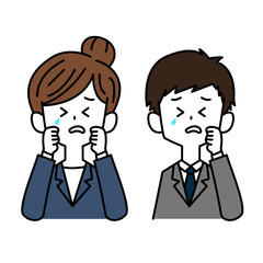 泣いているスーツを着た男女