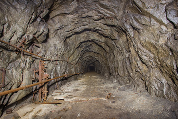 Underground abandoned iron ore mine tunnel