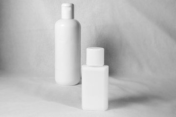 white cosmetic bottle monochrome