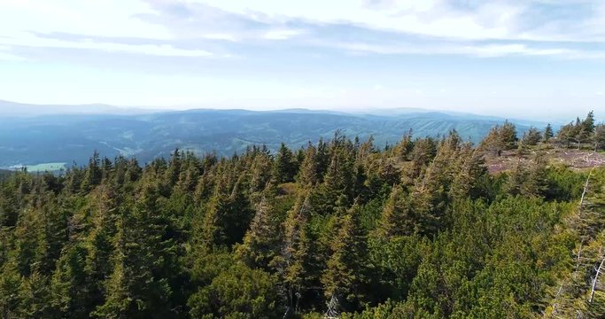 Aerial view of the top of mount Serak where is a tourist wooden cottage
