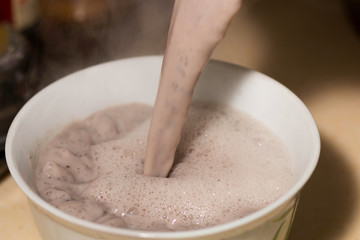 pouring Soya-bean milk into bowl