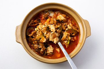 Korean spicy silken tofu stew which is called Sundubu Jjigae