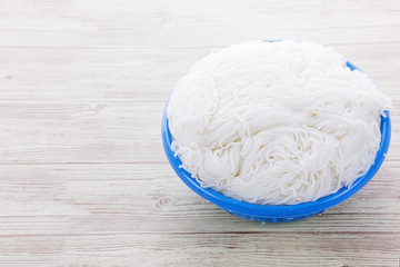 Rice noodle with plastic basket
