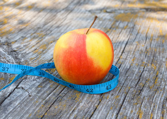 Apple and tape measure
