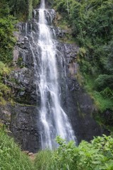 Fototapeta na wymiar Scenic waterfall in the forest in rural Kenya, Aberdare Ranges, Kenya