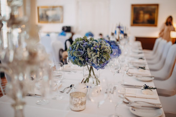 photo of dinner table with empty plates on
