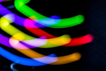 Abstract Neon Lights on Black Background Blurred and Moving 80s Vibe Disco