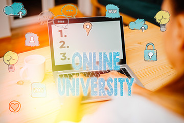 Word writing text Online University. Business photo showcasing Distance Learning Courses are taken...