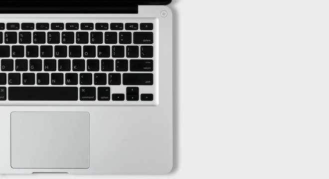 Isolated top view laptop on white background for text space.