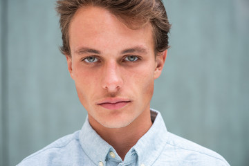 young man with serious face expression