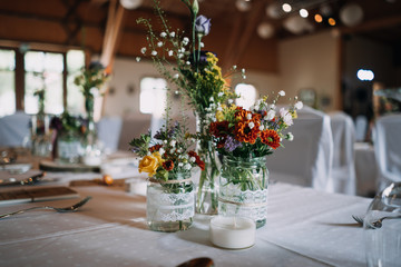 photo of empty wedding hall and empty tables